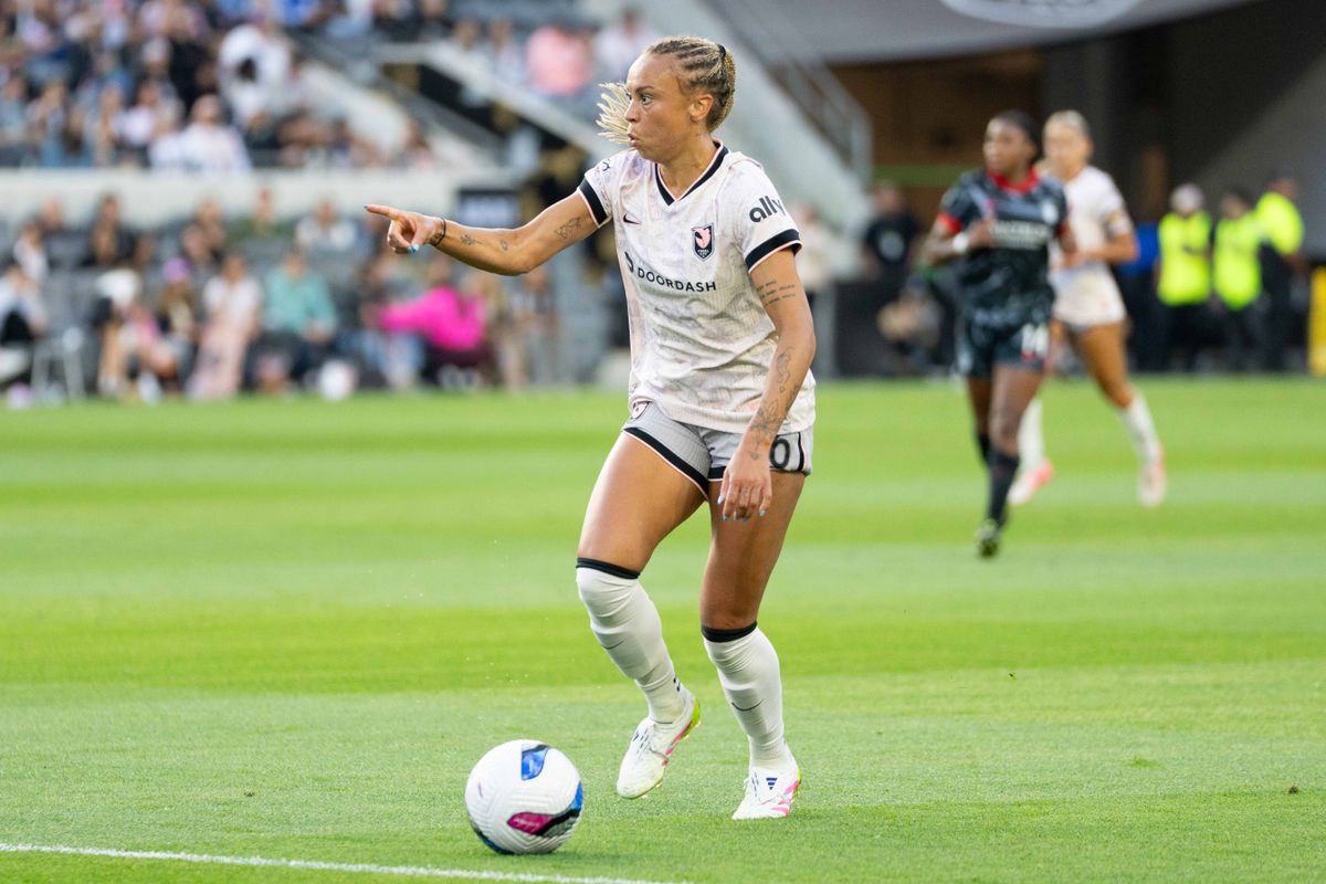 Angel City FC forward defender M.A. Vignola  (16) looking for an open teammate at an NWSL game against the Chicago Stars on Saturday June 7th, 2025 in Los Angeles, California.