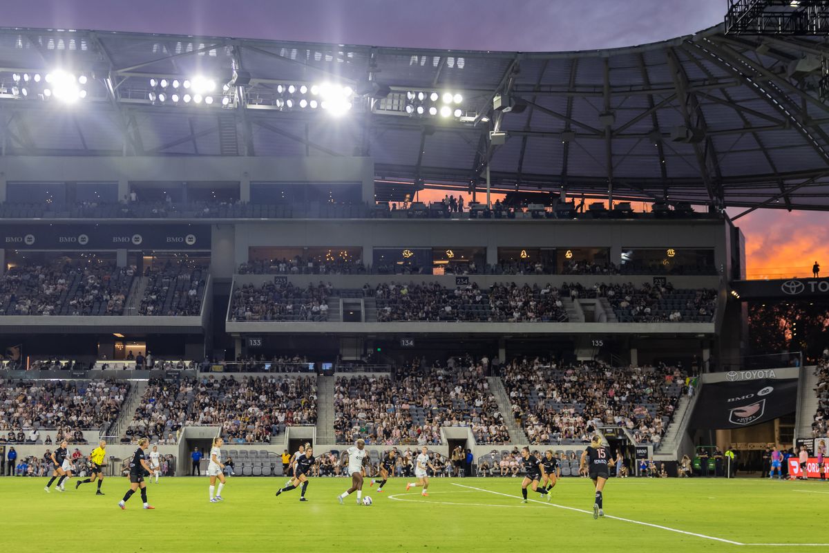 Racheal Kundananji #9 of Bay FC dribbles the ball towards the goal as the sun sets during an NWSL match against Angel City FC at BMO Stadium on September 1, 2025 in Los Angeles, California.