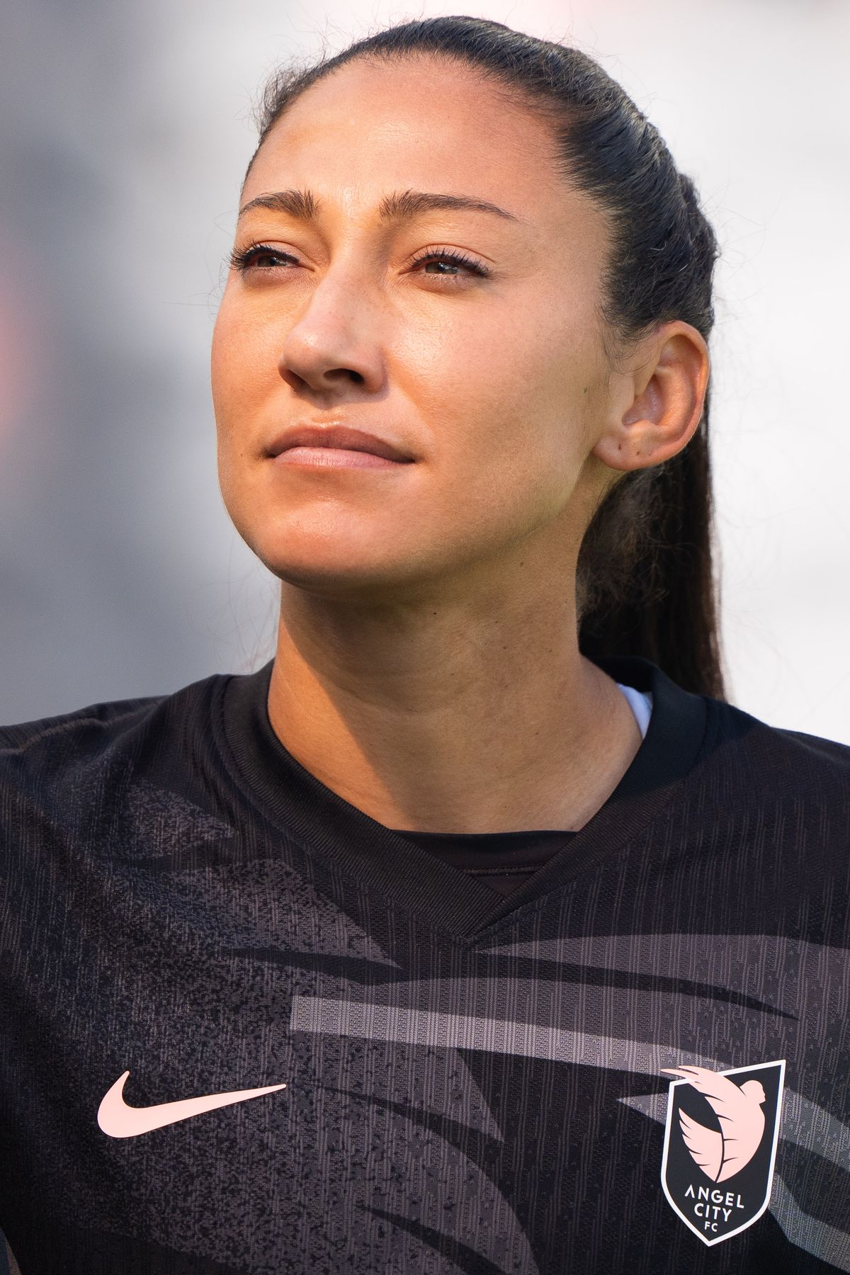 Angel City FC forward Christen Press (23) walks onto the field before her final match against the Portland Thorns, Sunday, Oct. 19, 2025, at BMO Stadium in Los Angeles, Calif.
