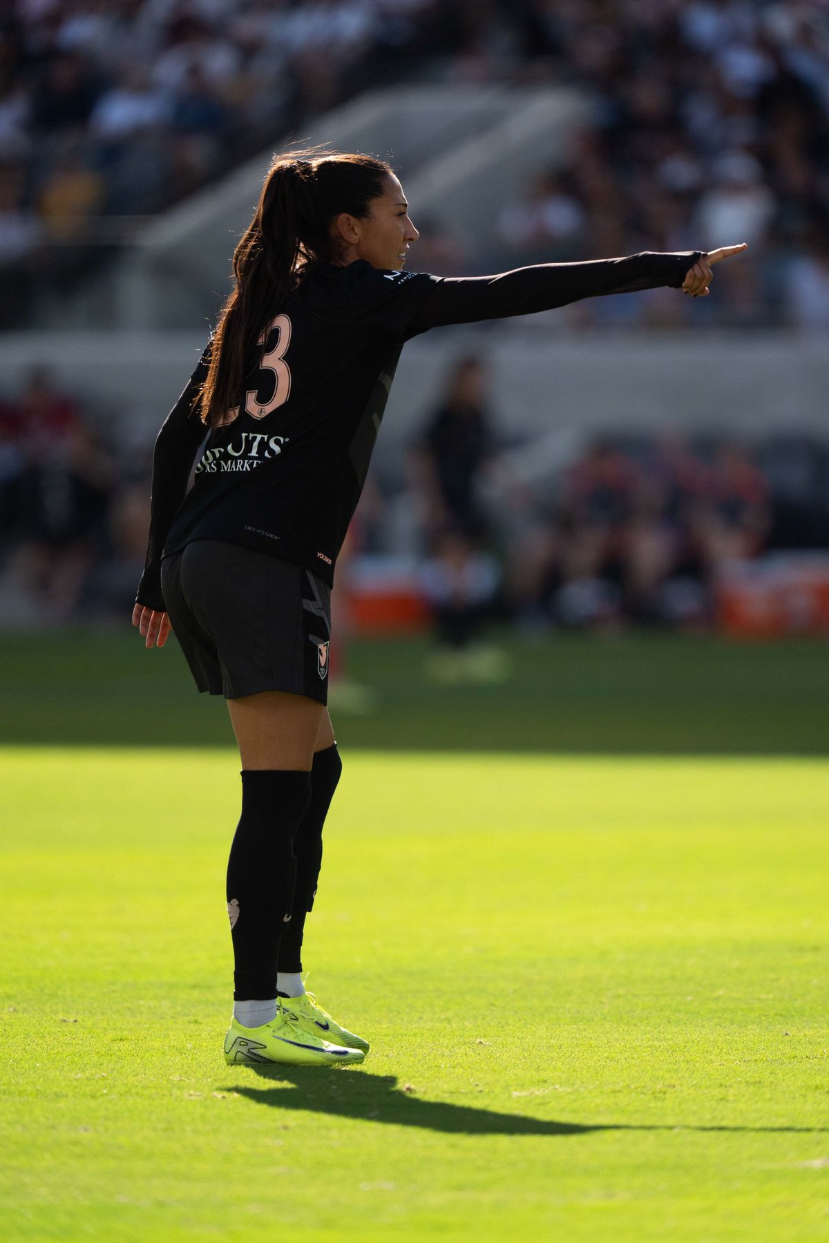 Angel City FC forward Christen Press (23) directs a teammate during the match against the Portland Thorns, Sunday, Oct. 19, 2025, at BMO Stadium in Los Angeles, Calif.