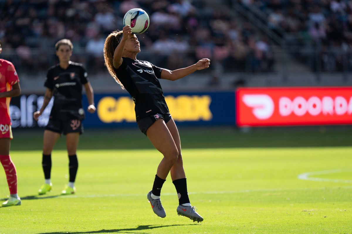 Angel City FC defender Sarah Gorden heads the ball to a teammate, Sunday, Oct. 19, 2025, at BMO Stadium in Los Angeles, Calif.