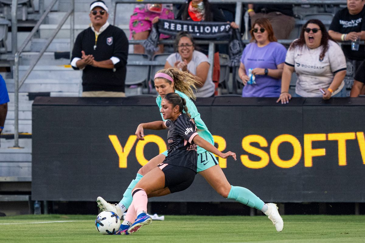 Angel City FC defender Emily Sams (6) fighting to keep the ball on offense during an NWSL game against the Kansas City Current on Wednesday May 20th, 2026 in Los Angeles, California.
