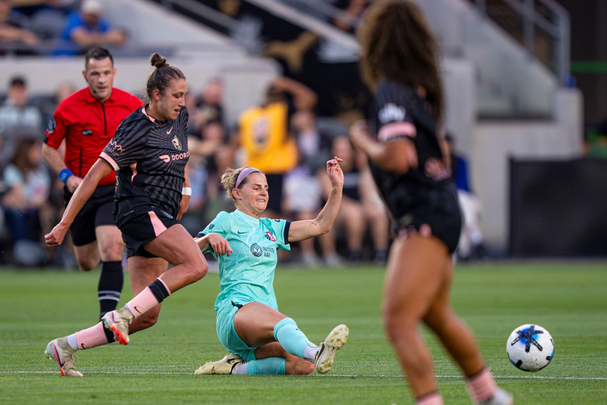 Kansas City Current midfielder Bayley Feist (22) making a tackle during an NWSL game against Angel City FC on Wednesday May 20th, 2026 in Los Angeles, California.