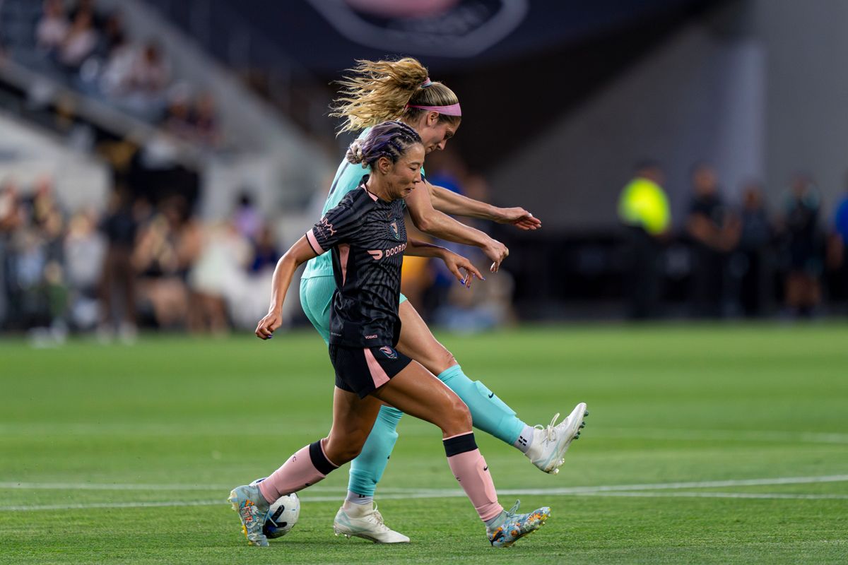 Angel City FC forward Jun Endo (18) covering an opposing defender during an NWSL game against the Kansas City Current on Wednesday May 20th, 2026 in Los Angeles, California.