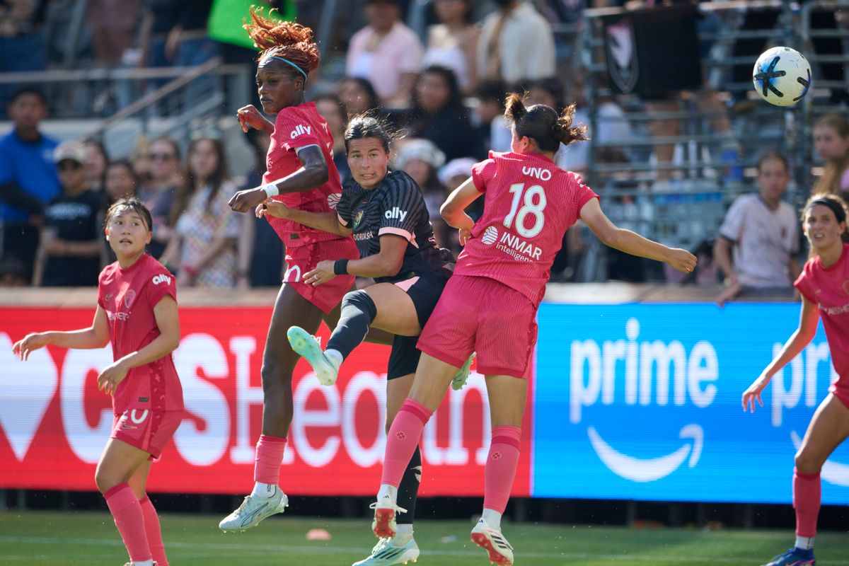 The Angel City FC Defender Emily Sams #6 jumps for a corner kick during an NWSL game against The North Carolina Courage on May 31st, 2026 at BMO Stadium in Los Angeles, California.