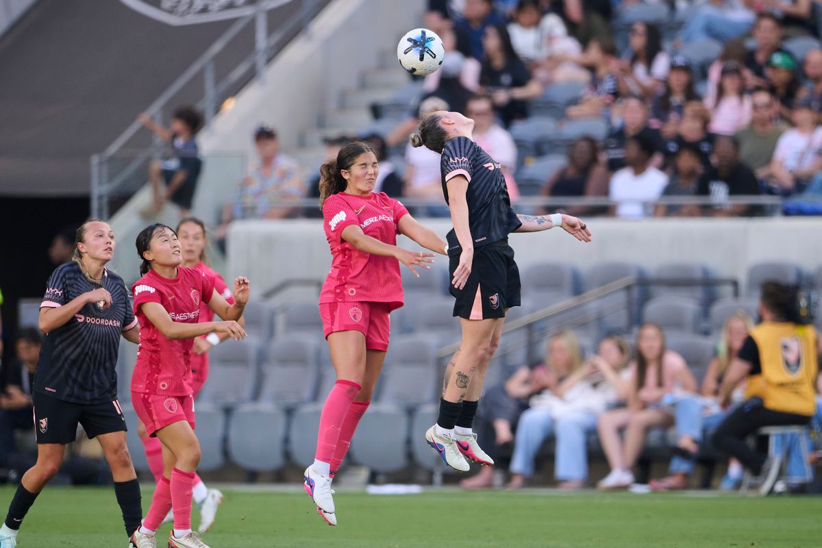 The Angel City FC Midfielder Maiara Niehues #12 jumps for the ball during an NWSL game against The North Carolina Courage on May 31st, 2026 at BMO Stadium in Los Angeles, California.