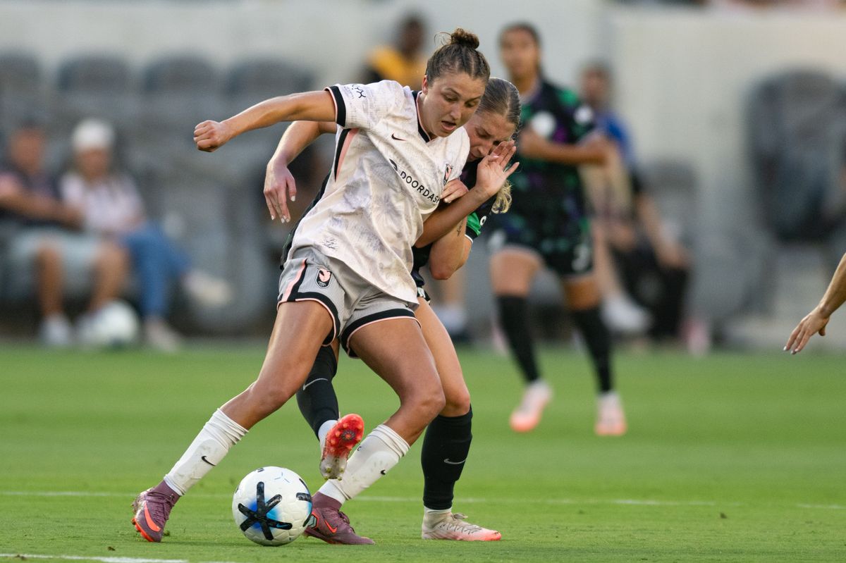 Angel City FC midfielder Carina Lageyre (16) protects the ball during an NWSL match between Racing Louisville FC and Angel City FC on Sunday, July 27, 2026 at BMO Stadium, Los Angeles Calif