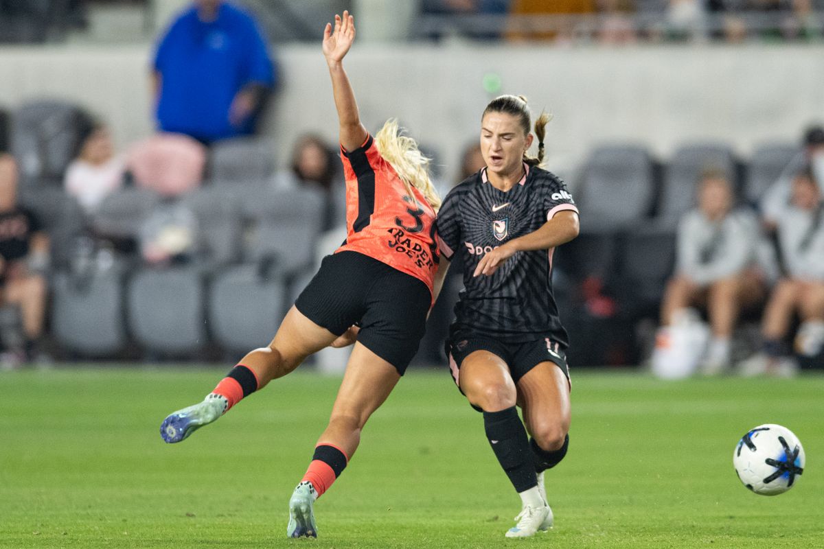 Angel City FC forward Ally Sentnor (17) collides with Bay FC defender Abby Dahlkemper (13) during an NWSL soccer game against Bay FC, Saturday, October 24, 2026 in Los Angeles. Angel City FC forward Ally Sentnor (17) collides with Bay FC defender Abby Dahlkemper (13) during an NWSL soccer game against Bay FC, Saturday, October 24, 2026 in Los Angeles.
