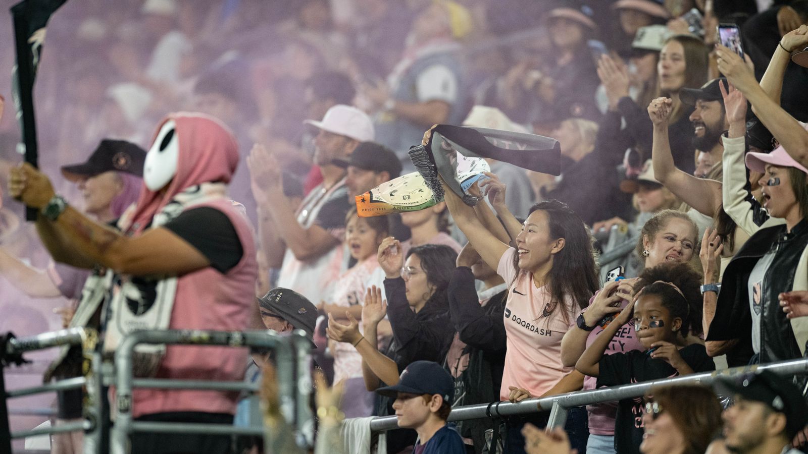 Angel City FC fans celebrate after the team scored a second goal during an NWSL soccer game against Bay FC, Saturday, October 24, 2026 in Los Angeles. Angel City FC fans celebrate after the team scored a second goal during an NWSL soccer game against Bay FC, Saturday, October 24, 2026 in Los Angeles.
