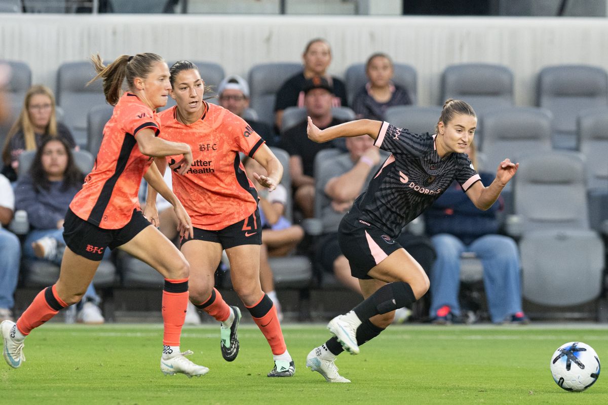 Angel City FC forward Ally Sentnor (17) gets the ball away from defenders during an NWSL soccer game against Bay FC, Saturday, October 24, 2026 in Los Angeles. Angel City FC forward Ally Sentnor (17) gets the ball away from defenders during an NWSL soccer game against Bay FC, Saturday, October 24, 2026 in Los Angeles.