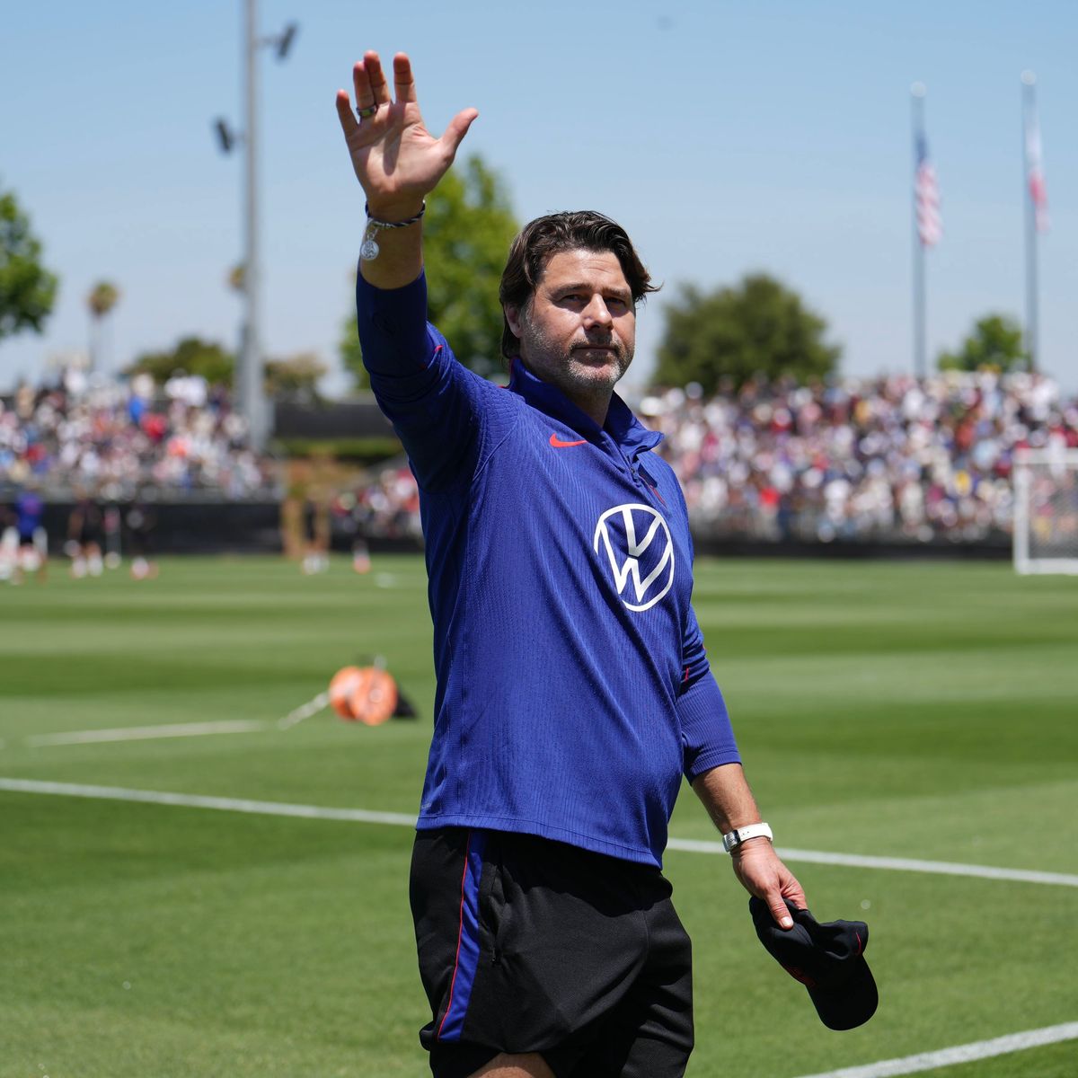 USMNT head coach Mauricio Pochettino waves to fans during a training session in Irvine, California, on June 8, 2026, ahead of the 2026 FIFA World Cup. USMNT head coach Mauricio Pochettino waves to fans during a training session in Irvine, California, on June 8, 2026, ahead of the 2026 FIFA World Cup.