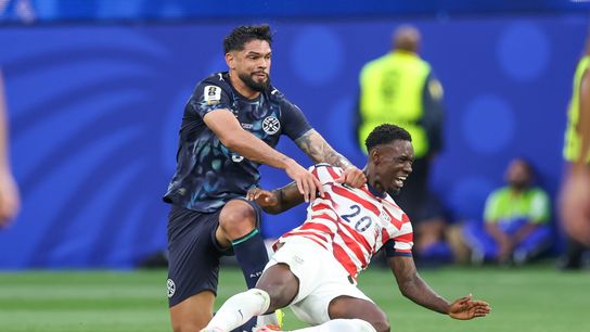 Omar Alderete #3 of Paraguay pushes Folarin Balogun #20 of United States to the ground during a 2026 FIFA World Cup match, Friday June 12, 2026 in Inglewood, Calif. Omar Alderete #3 of Paraguay pushes Folarin Balogun #20 of United States to the ground during a 2026 FIFA World Cup match, Friday June 12, 2026 in Inglewood, Calif.