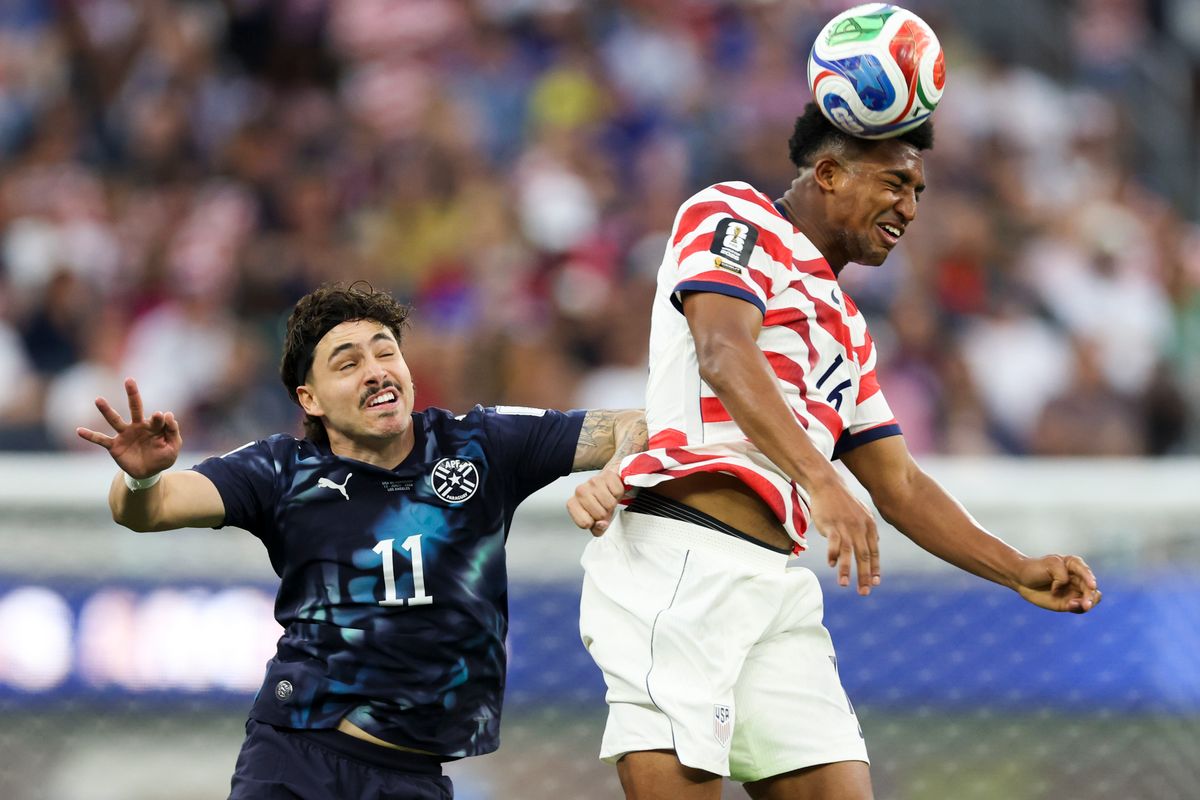 Alex Freeman #16 of United States and Maurício #11 of Paraguay compete for a ball during a 2026 FIFA World Cup match, Friday June 12, 2026 in Inglewood, Calif.