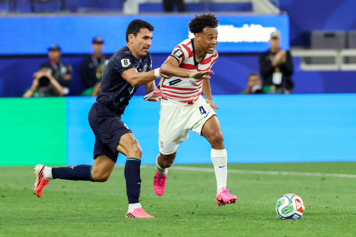Junior Alonso #6 of Paraguay pulls the jersey of Tyler Adams #4 of United States as he chases the ball during a 2026 FIFA World Cup match, Friday June 12, 2026 in Inglewood, Calif.