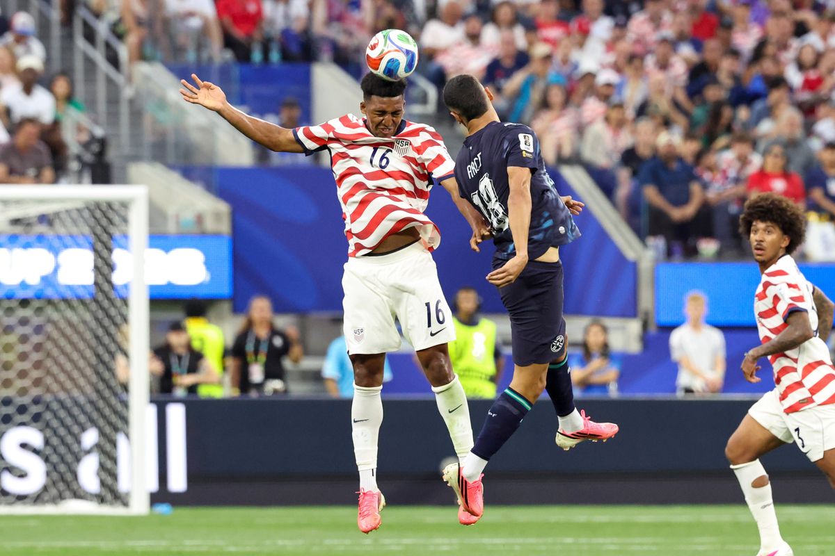 Alex Freeman #16 of United States and Álex Arce #18 of Paraguay compete for a ball during a 2026 FIFA World Cup match, Friday June 12, 2026 in Inglewood, Calif.