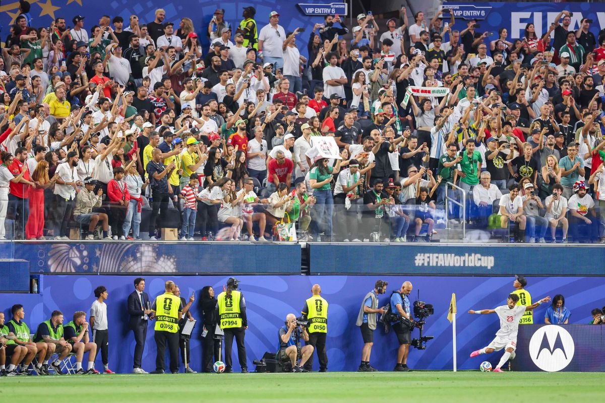 Ramin Rezaeian #23 of Iran takes a corner kick as fans look on during a FIFA World Cup 2026 match against New Zealand, Monday June 15, 2026 in Inglewood, Calif.
