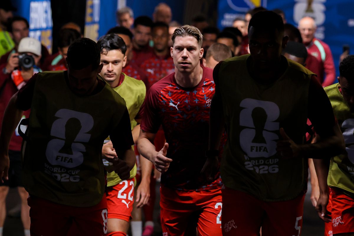 Switzerland runs out of the tunnel for warm ups before a FIFA World Cup 2026 match against Bosnia and Herzegovina, Thursday June 18, 2026 in Inglewood, Calif. Switzerland runs out of the tunnel for warm ups before a FIFA World Cup 2026 match against Bosnia and Herzegovina, Thursday June 18, 2026 in Inglewood, Calif.