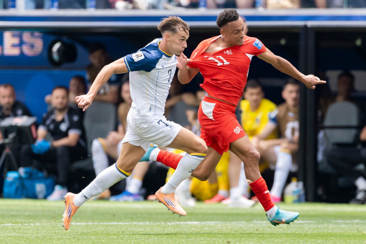 Amar Dedić #7 of Bosnia and Herzegovina pulls the jersey of Dan Ndoye #11 of Switzerland during a 2026 FIFA World Cup match, Thursday June 18, 2026 in Inglewood, Calif. Amar Dedić #7 of Bosnia and Herzegovina pulls the jersey of Dan Ndoye #11 of Switzerland during a 2026 FIFA World Cup match, Thursday June 18, 2026 in Inglewood, Calif.
