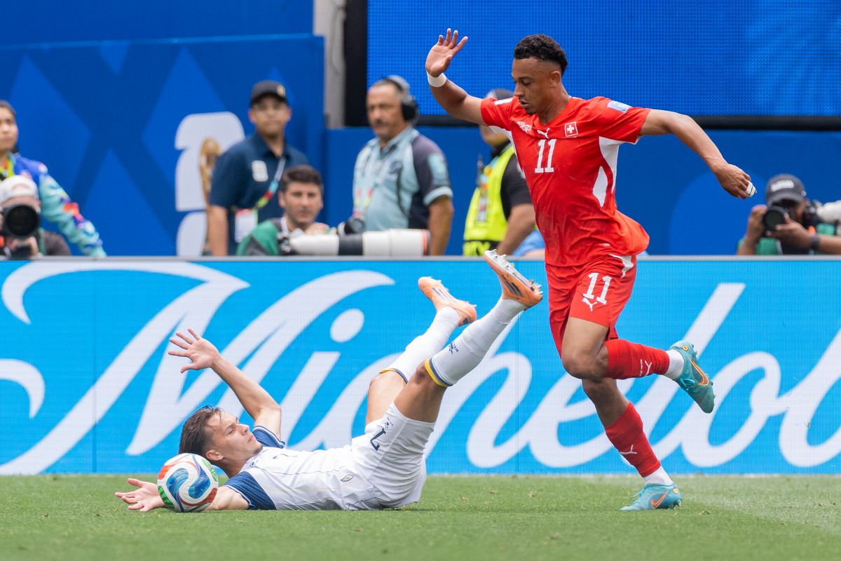 Amar Dedić #7 of Bosnia and Herzegovina falls down while competing with Dan Ndoye #11 of Switzerland during a 2026 FIFA World Cup match, Thursday June 18, 2026 in Inglewood, Calif. Amar Dedić #7 of Bosnia and Herzegovina falls down while competing with Dan Ndoye #11 of Switzerland during a 2026 FIFA World Cup match, Thursday June 18, 2026 in Inglewood, Calif.