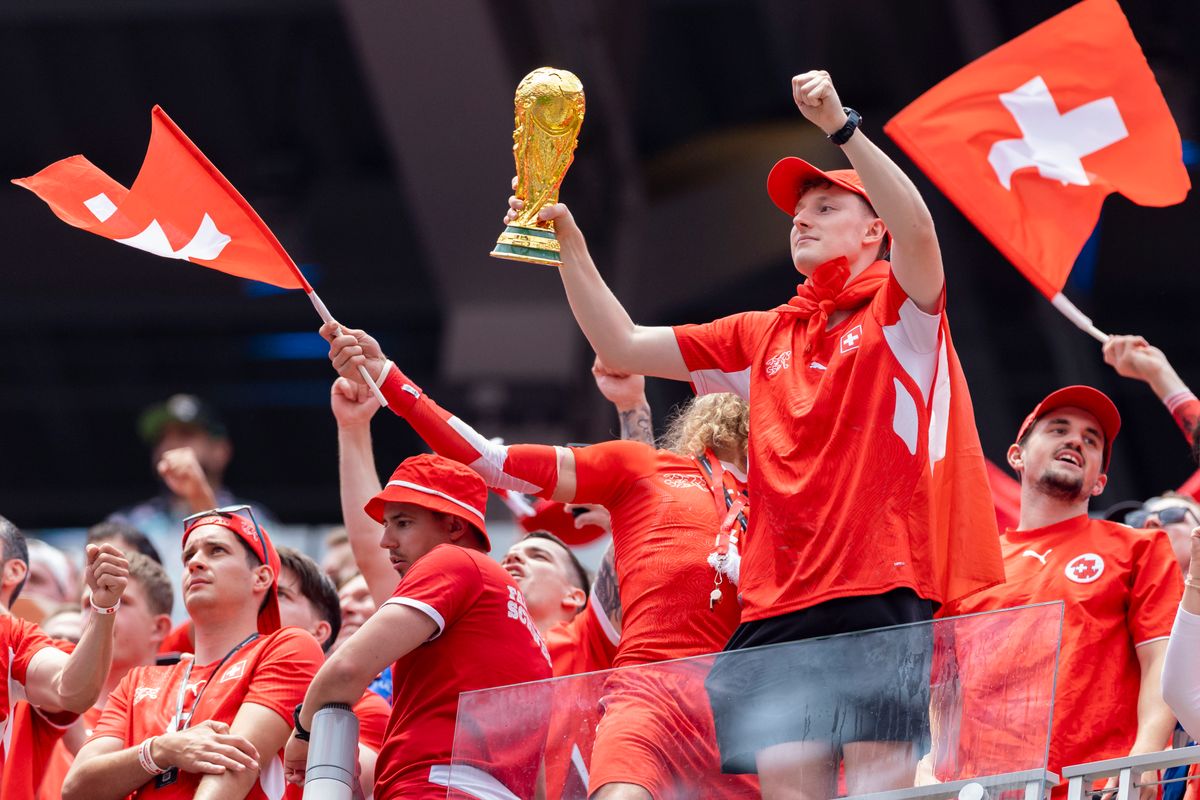 A Switzerland fan cheers in the stands during a 2026 FIFA World Cup match between Switzerland and Bosnia and Herzegovina, Thursday June 18, 2026 in Inglewood, Calif. A Switzerland fan cheers in the stands during a 2026 FIFA World Cup match between Switzerland and Bosnia and Herzegovina, Thursday June 18, 2026 in Inglewood, Calif.