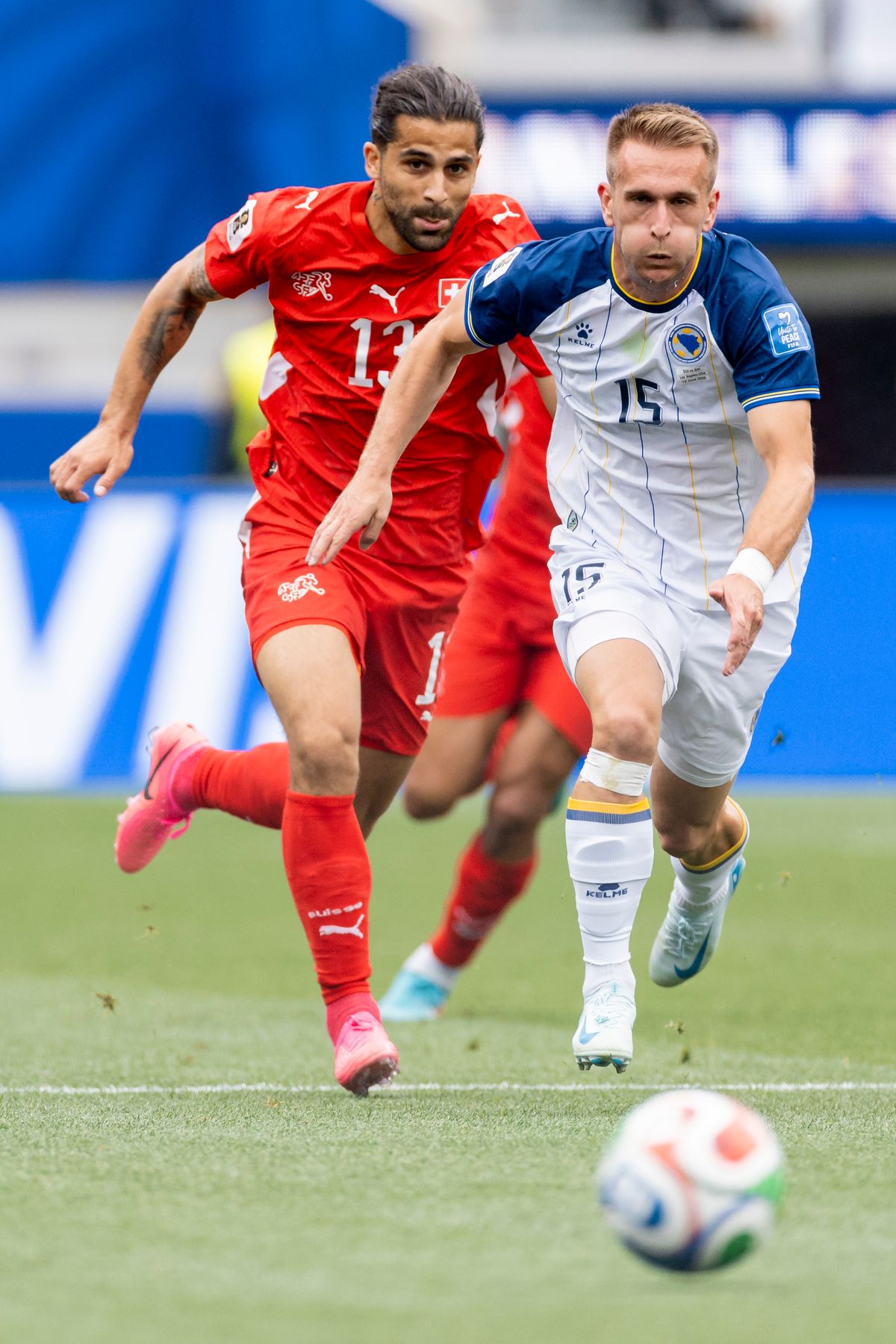 Ricardo Rodríguez #13 of Switzerland and Amar Memić #15 of Bosnia and Herzegovina chase the ball during a 2026 FIFA World Cup match, Thursday June 18, 2026 in Inglewood, Calif. Ricardo Rodríguez #13 of Switzerland and Amar Memić #15 of Bosnia and Herzegovina chase the ball during a 2026 FIFA World Cup match, Thursday June 18, 2026 in Inglewood, Calif.
