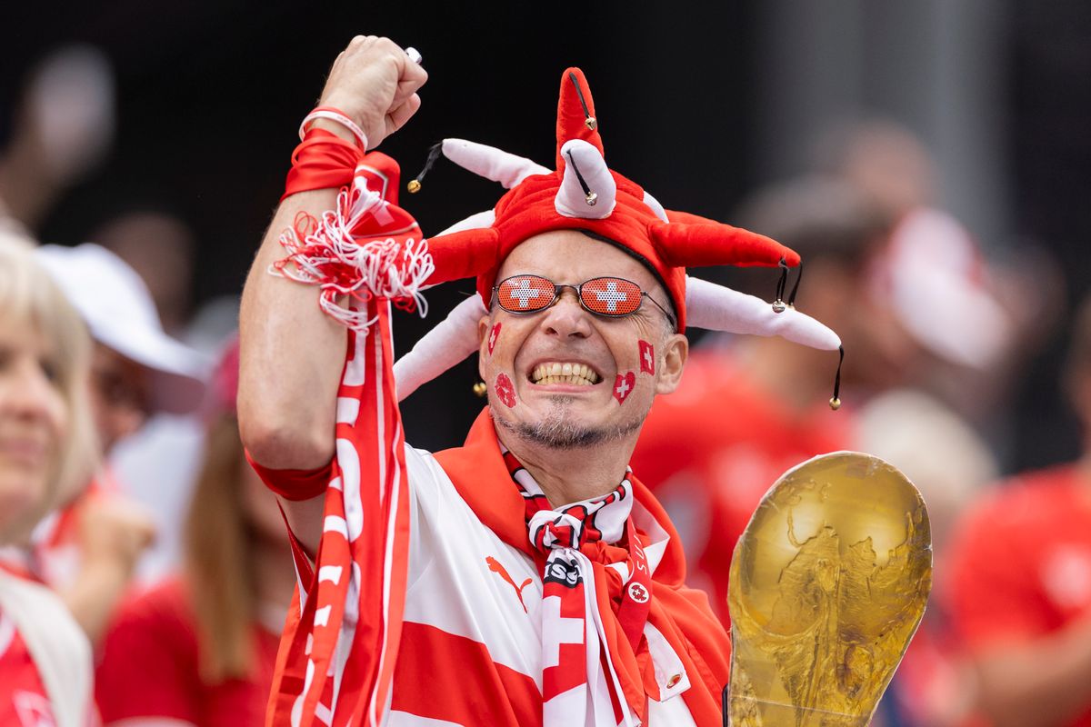 A Switzerland fan cheers during a 2026 FIFA World Cup match between Switzerland and Bosnia and Herzegovina, Thursday June 18, 2026 in Inglewood, Calif. A Switzerland fan cheers during a 2026 FIFA World Cup match between Switzerland and Bosnia and Herzegovina, Thursday June 18, 2026 in Inglewood, Calif.