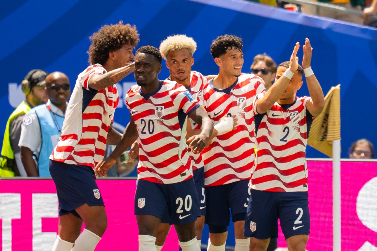 The United States team celebrates their first goal during a FIFA World Cup match against Australia, Friday June 19th, 2026 in Seattle, Washington. The United States team celebrates their first goal during a FIFA World Cup match against Australia, Friday June 19th, 2026 in Seattle, Washington.