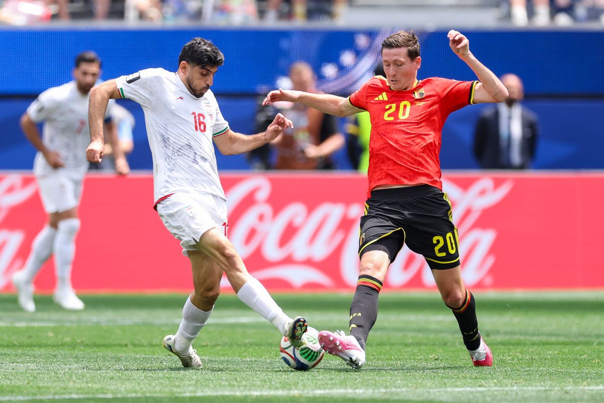 Mehdi Torabi #16 of Iran and Hans Vanaken #20 of Belgium fight for the ball during a 2026 FIFA World Cup match, Sunday June 21, 2026 in Inglewood, Calif. Mehdi Torabi #16 of Iran and Hans Vanaken #20 of Belgium fight for the ball during a 2026 FIFA World Cup match, Sunday June 21, 2026 in Inglewood, Calif.