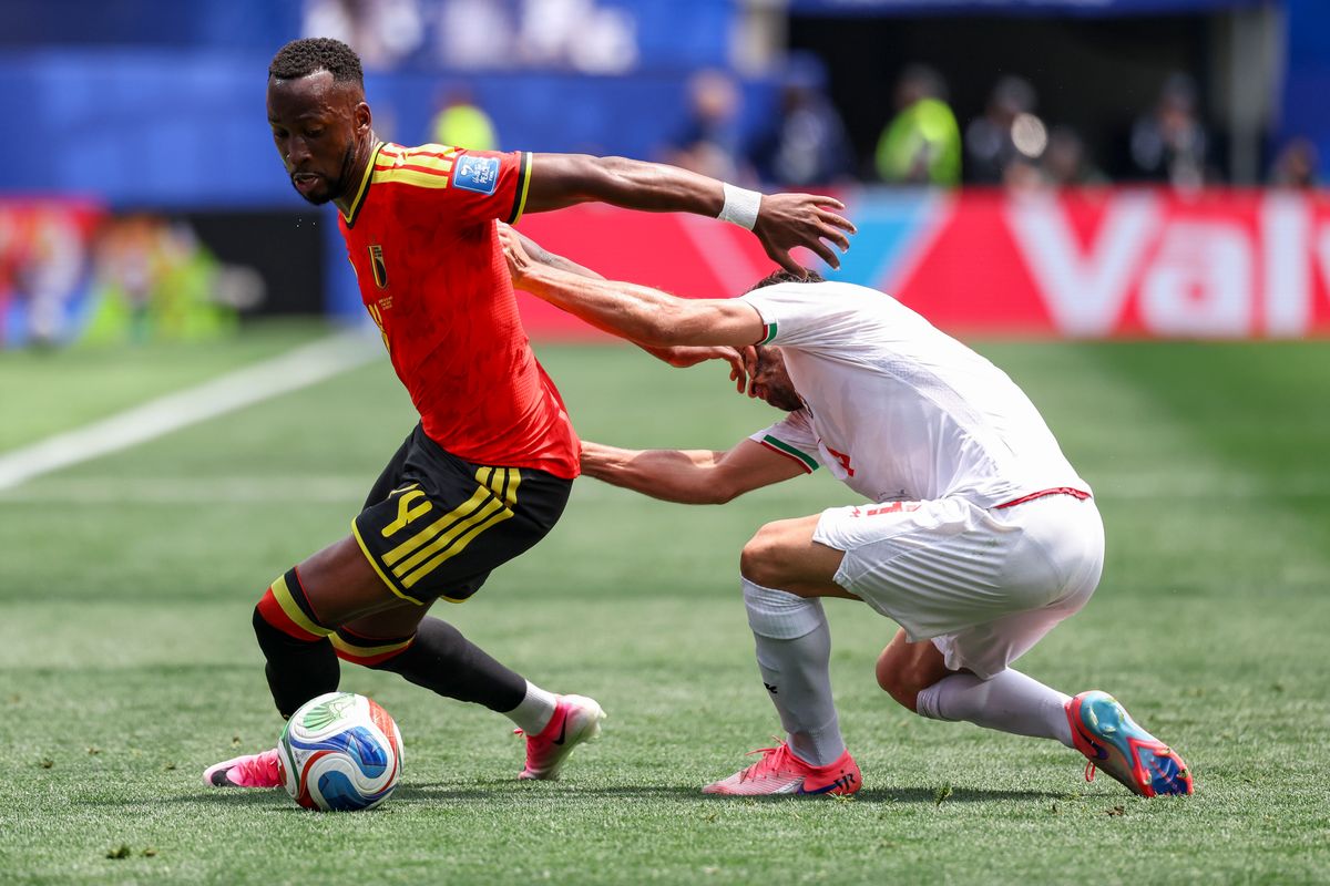 Dodi Lukebakio #14 of Belgium and Shoja Khalilzadeh #4 of Iran battle for the ball during a 2026 FIFA World Cup match, Sunday June 21, 2026 in Inglewood, Calif. Dodi Lukebakio #14 of Belgium and Shoja Khalilzadeh #4 of Iran battle for the ball during a 2026 FIFA World Cup match, Sunday June 21, 2026 in Inglewood, Calif.