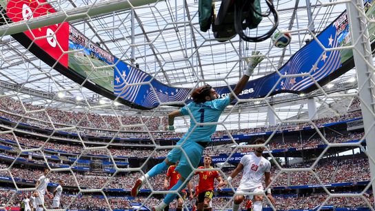 Alireza Beiranvand #1 of Iran dives for the ball during a 2026 FIFA World Cup match against Belgium, Sunday June 21, 2026 in Inglewood, Calif.