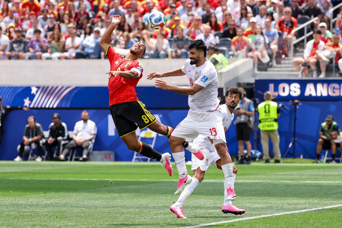 Youri Tielemans #8 of Belgium and Hossein Kanani #13 of Iran jump for the ball during a 2026 FIFA World Cup match, Sunday June 21, 2026 in Inglewood, Calif. Youri Tielemans #8 of Belgium and Hossein Kanani #13 of Iran jump for the ball during a 2026 FIFA World Cup match, Sunday June 21, 2026 in Inglewood, Calif.