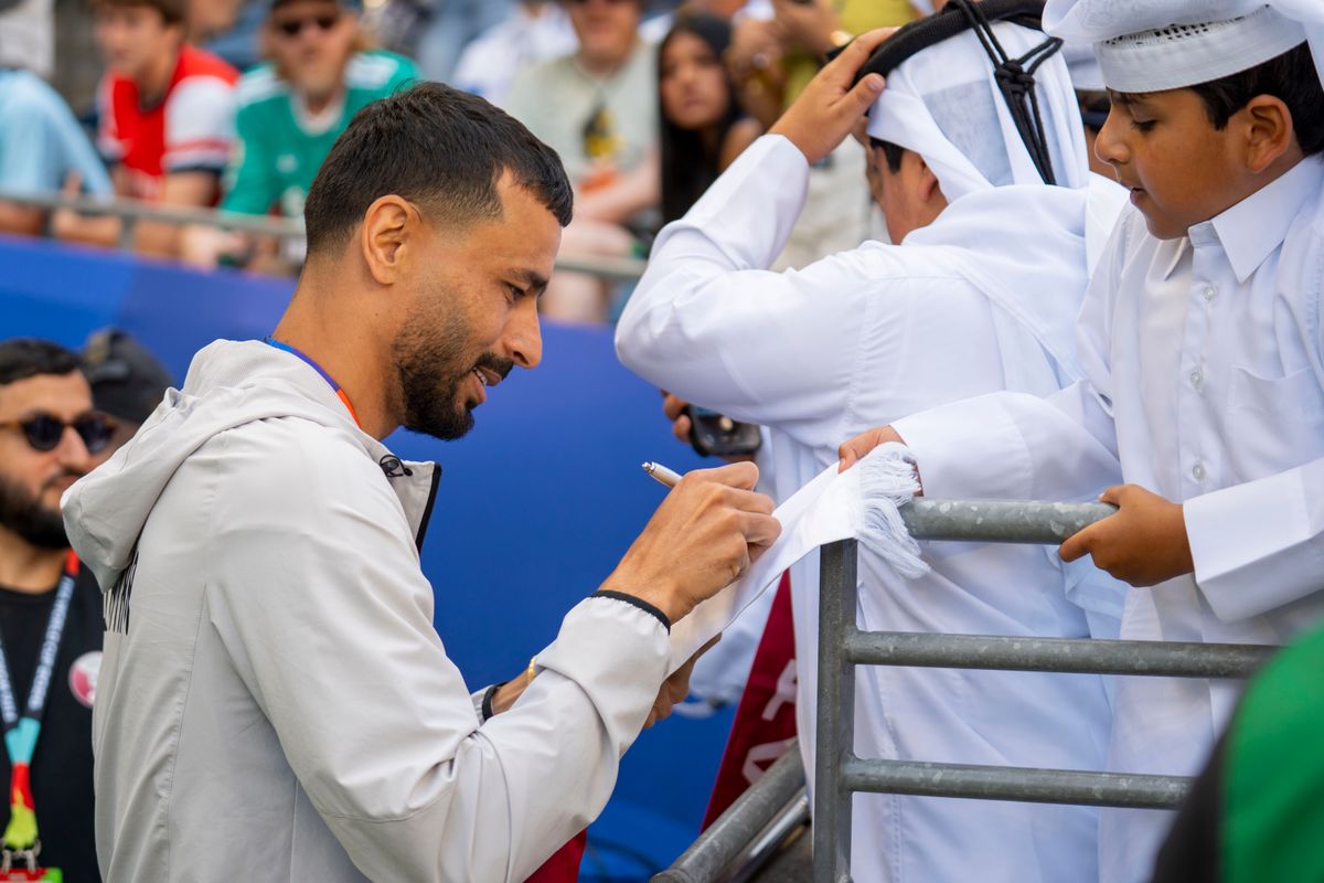 #16 Boualem Khoukhi of Qatar greeting the fans before a FIFA World Cup match against Bosnia-Herzegovina, Wednesday June 24th, 2026 in Seattle, Washington. 