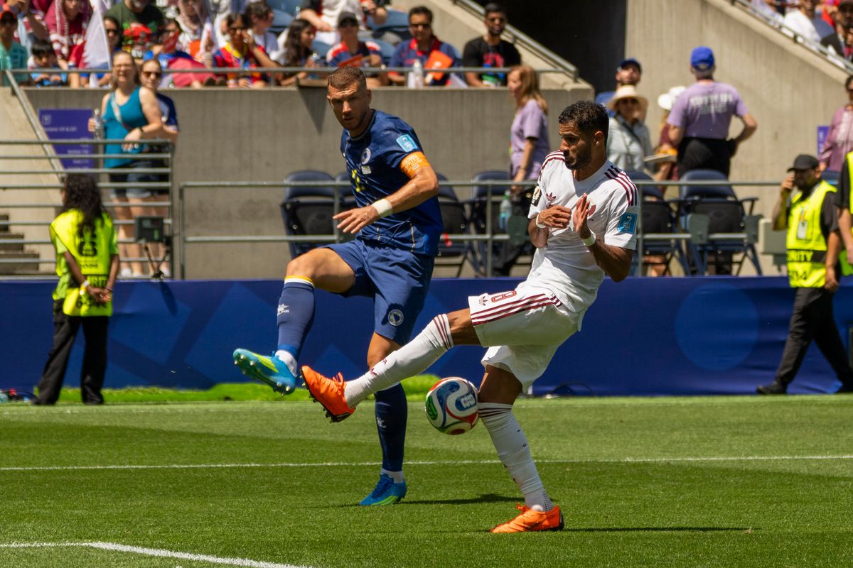 #11 Edin Dzeko of Bosnia-Herzegovina scores after the ball hits off of a defender during a FIFA World Cup match against Qatar, Wednesday June 24th, 2026 in Seattle, Washington. 