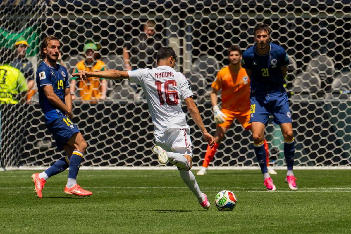 #16 Boualem Khoukhi of Qatar takes a shot at the goal during a FIFA World Cup match against Bosnia-Herzegovina, Wednesday June 24th, 2026 in Seattle, Washington. 
