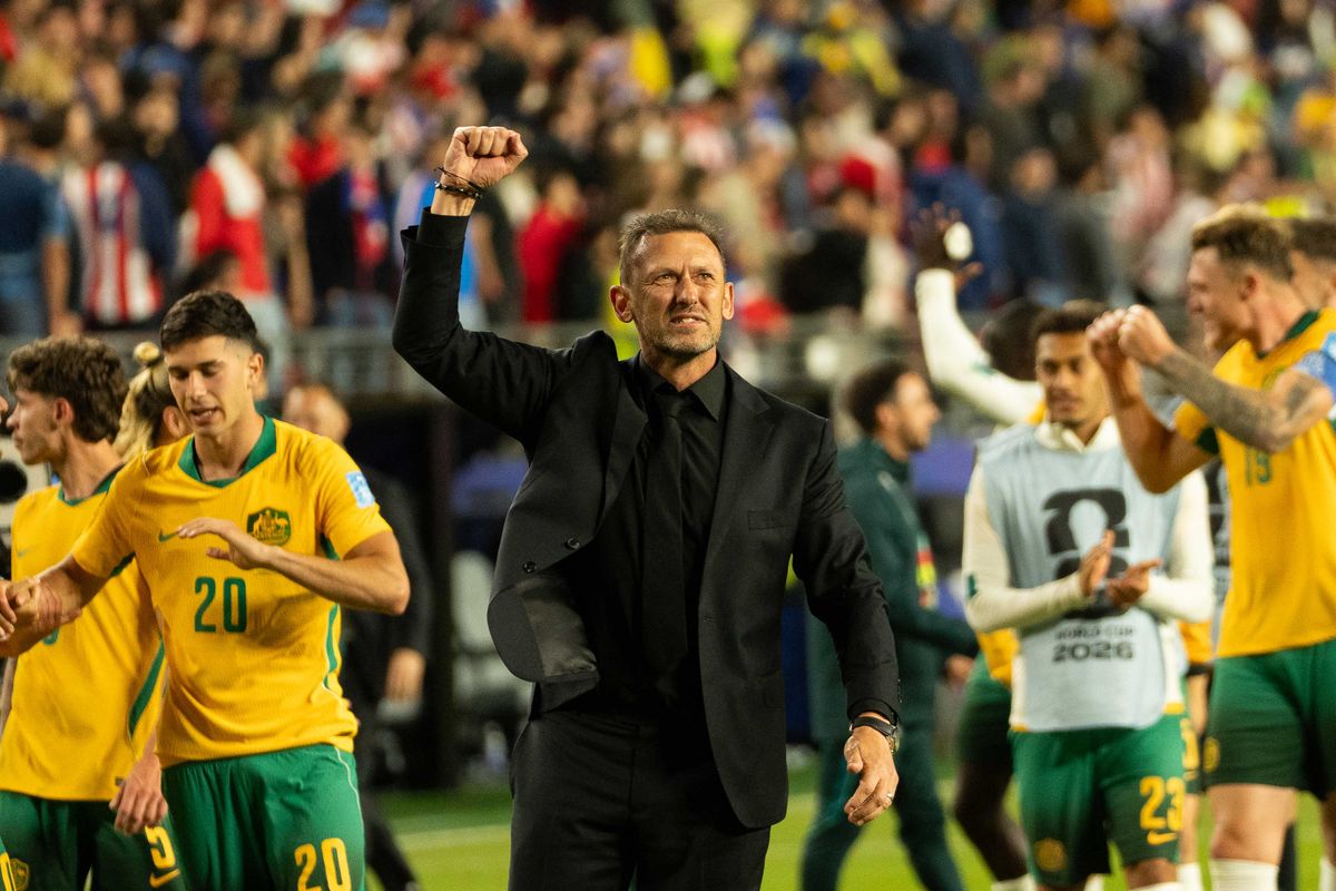 Head Coach Tony Popovic of  Australia cheers with fans during a 2026 FIFA World Cup match against Paraguay, Thursday June 25th, 2026 in Santa Clara, Calif.
