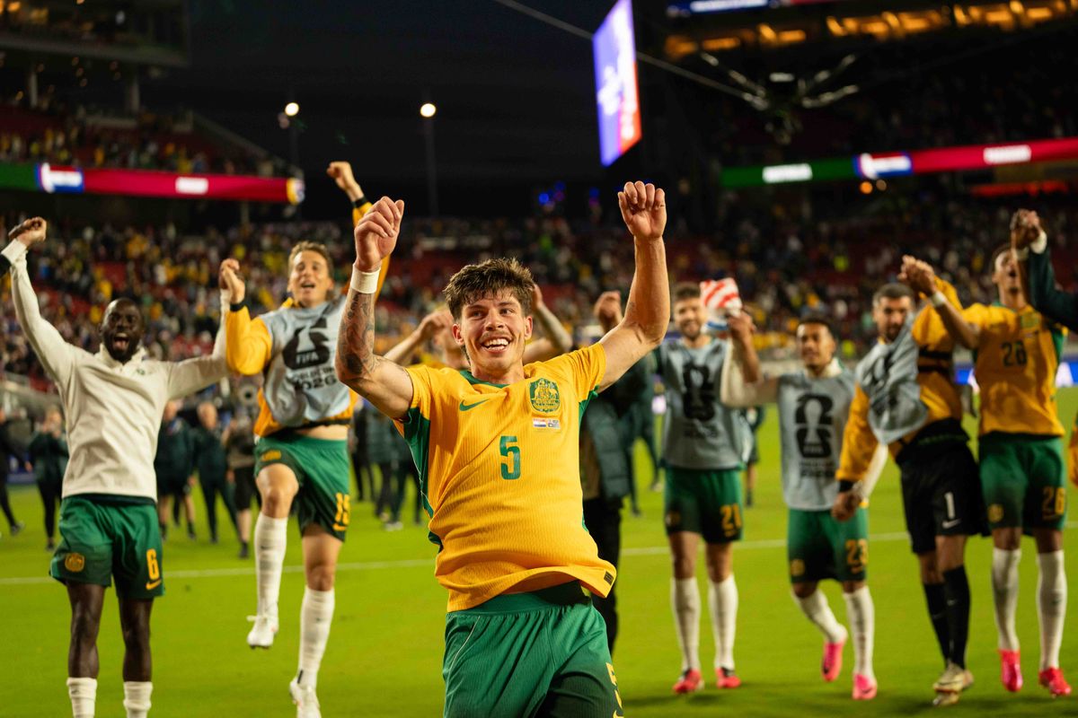 Jordan Bos (5) of  Australia leads cheer with fans during a 2026 FIFA World Cup match against Paraguay, Thursday June 25th, 2026 in Santa Clara, Calif.
