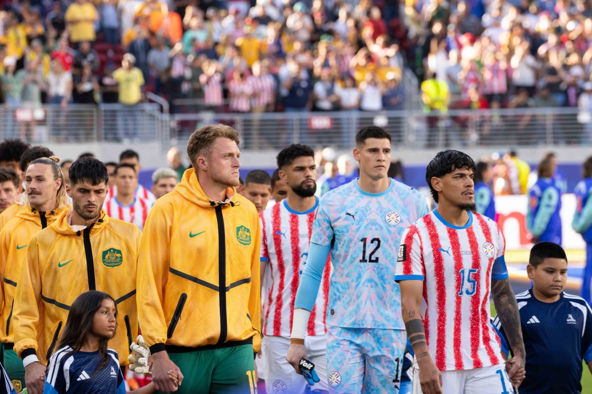 Australia and Paraguay walk out together at a 2026 FIFA World Cup match, Thursday June 25th, 2026 in Santa Clara, Calif.