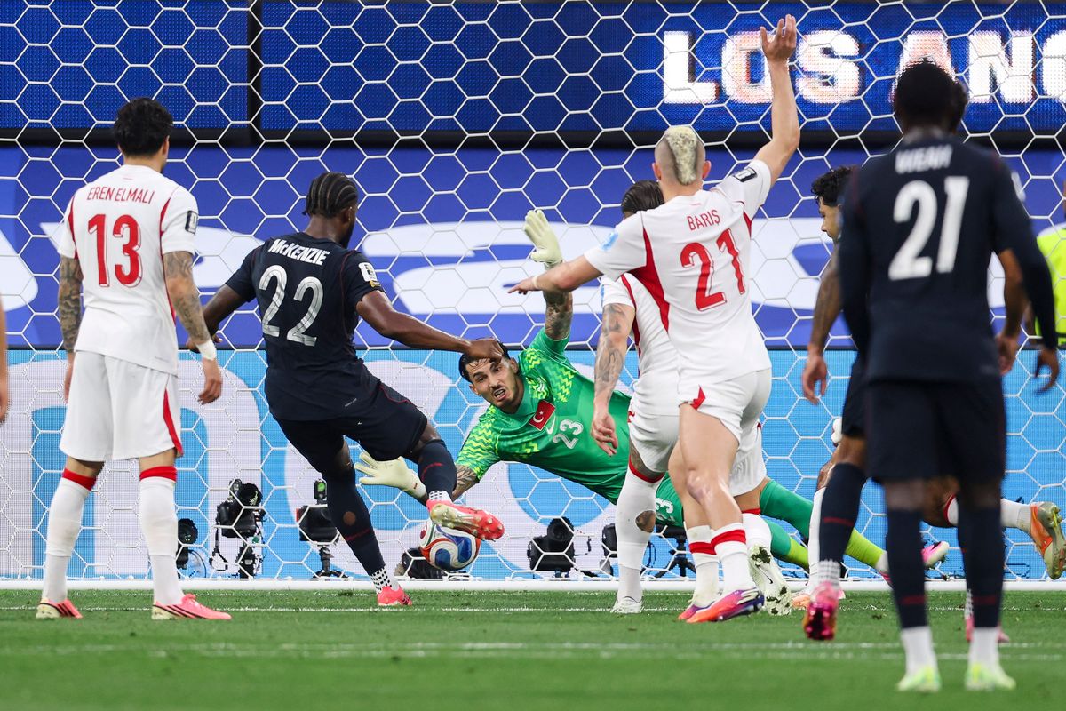 Uğurcan Çakır #23 of Türkiye dives to block a shot by Mark McKenzie #22 of the United States during a 2026 FIFA World Cup match, Thursday June 25, 2026 in Inglewood, Calif.