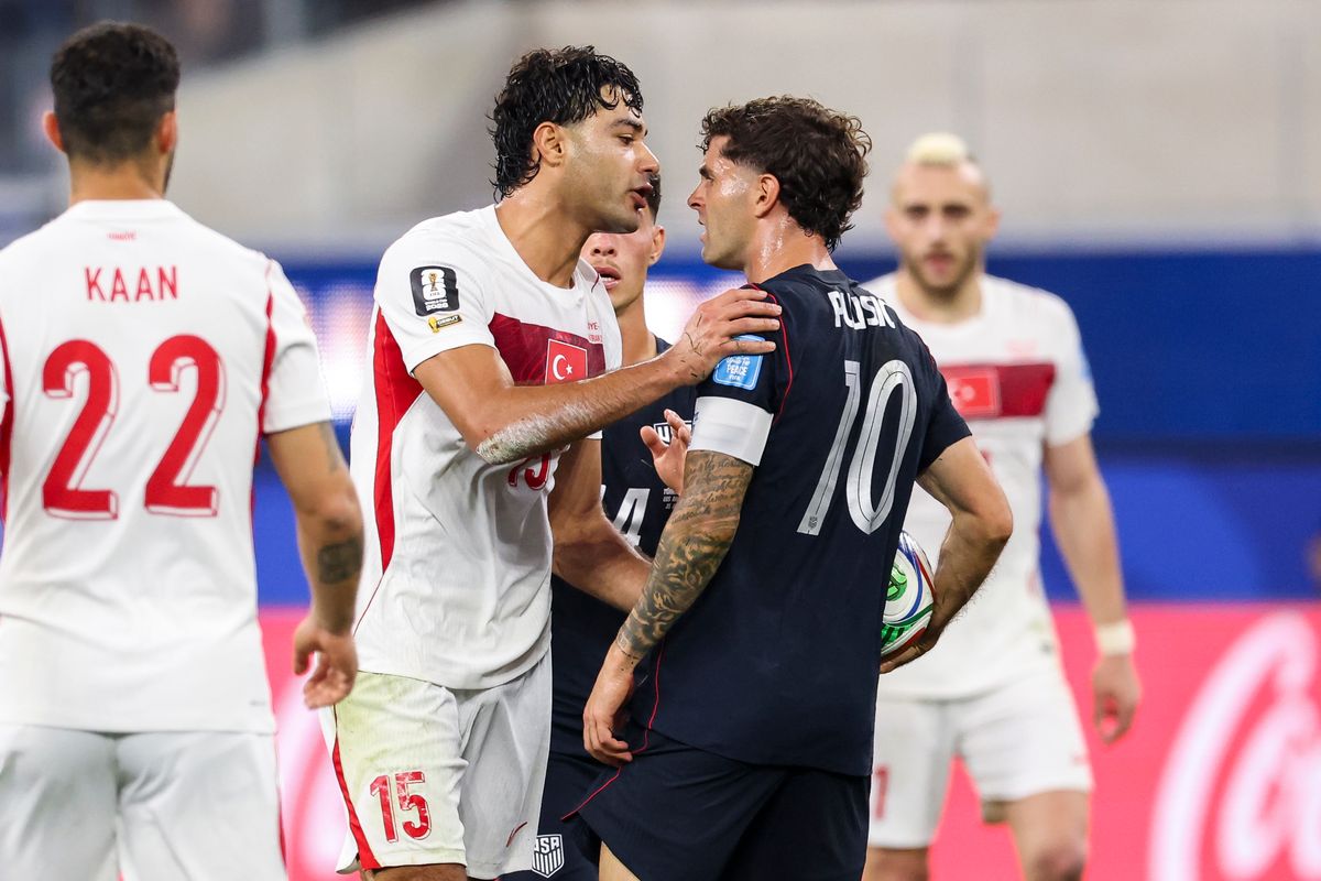 Ozan Kabak #15 of Türkiye and Christian Pulisic #10 of the United States have a disagreement during a 2026 FIFA World Cup match, Thursday June 25, 2026 in Inglewood, Calif.