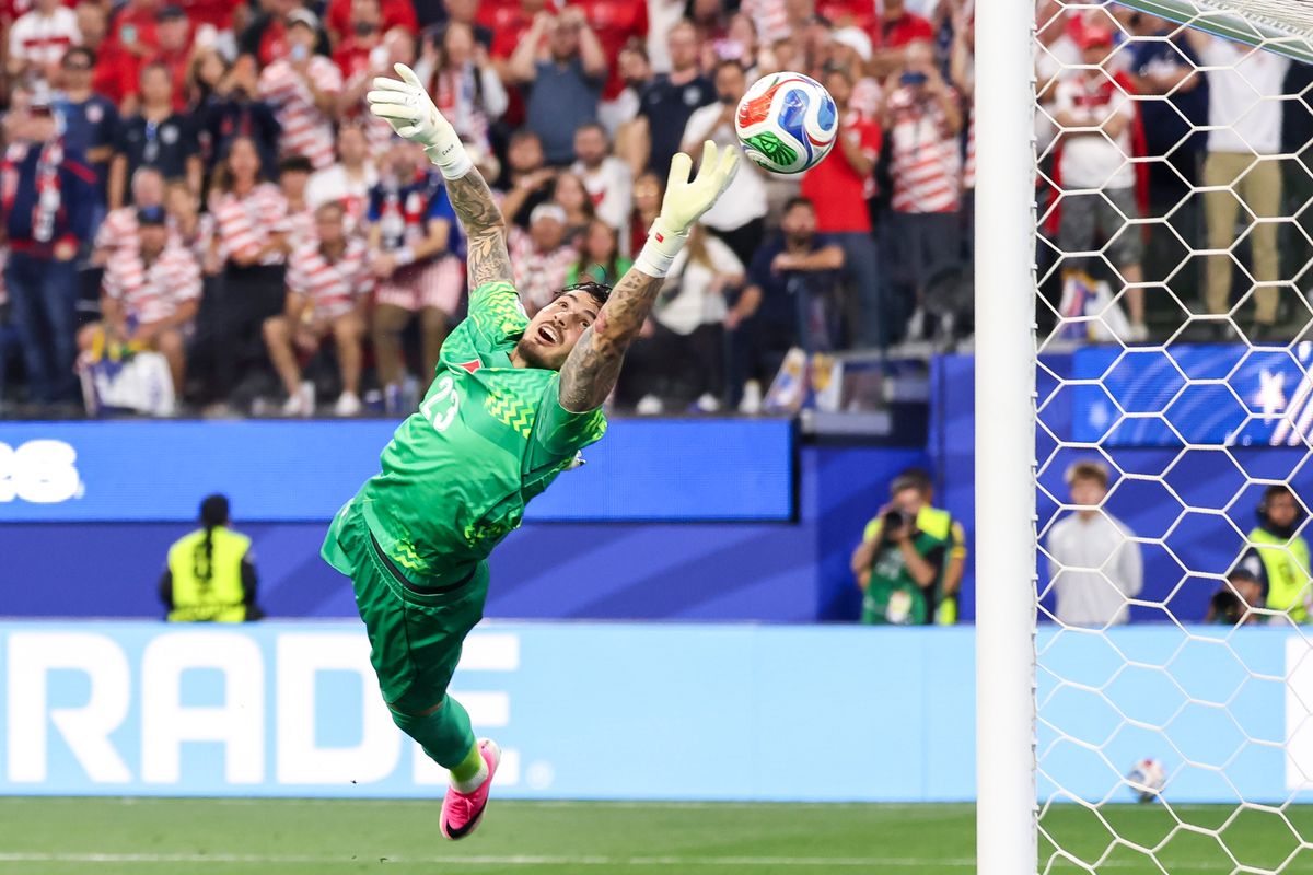 Uğurcan Çakır #23 of Türkiye dives for a ball that goes off the post during a 2026 FIFA World Cup match against the United States, Thursday June 25, 2026 in Inglewood, Calif.