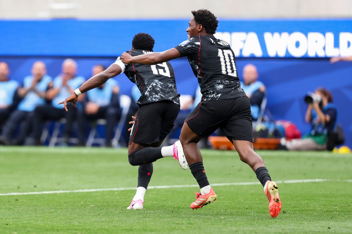 Jonathan David #10 and Alphonso Davies #19 of Canada celebrate the game winning goal during a FIFA World Cup 2026 match against South Africa, Sunday June 28, 2026 in Inglewood, Calif.