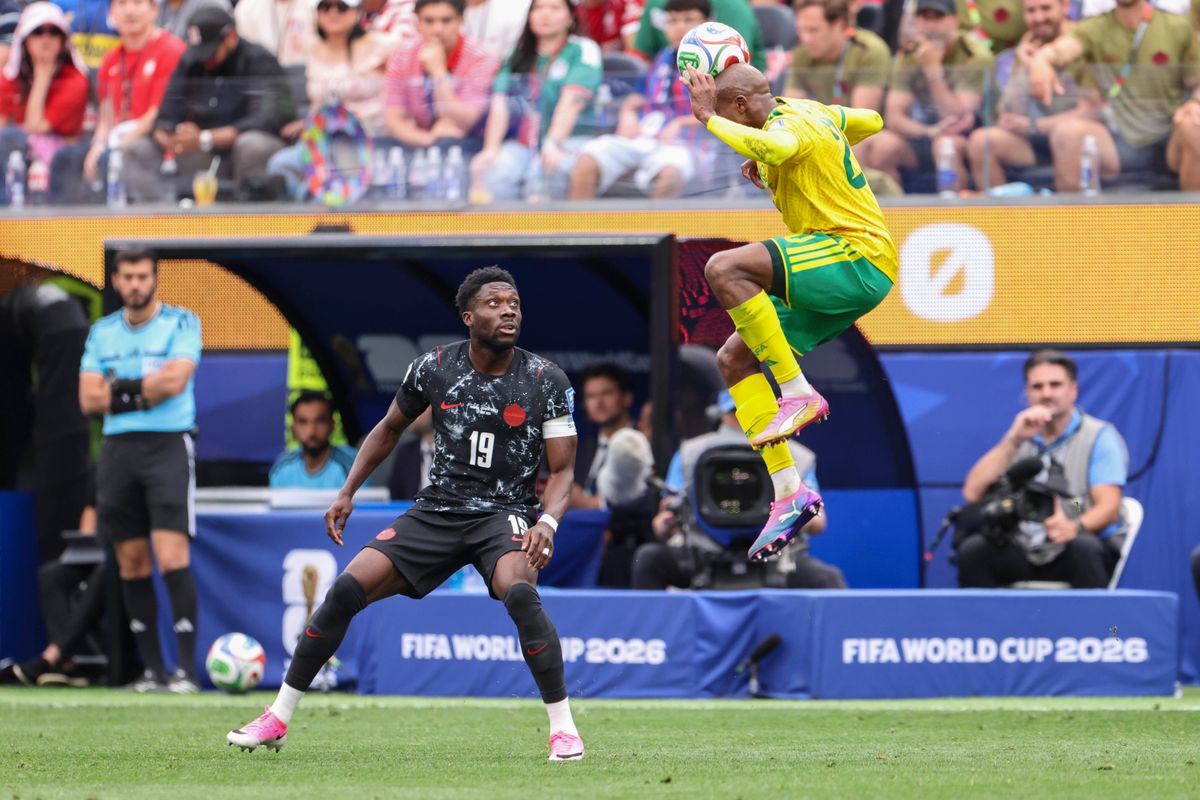 Khuliso Mudau #20 of South Africa head the ball as Alphonso Davies #19 of Canada looks on during a 2026 FIFA World Cup match, Sunday June 28, 2026 in Inglewood, Calif.