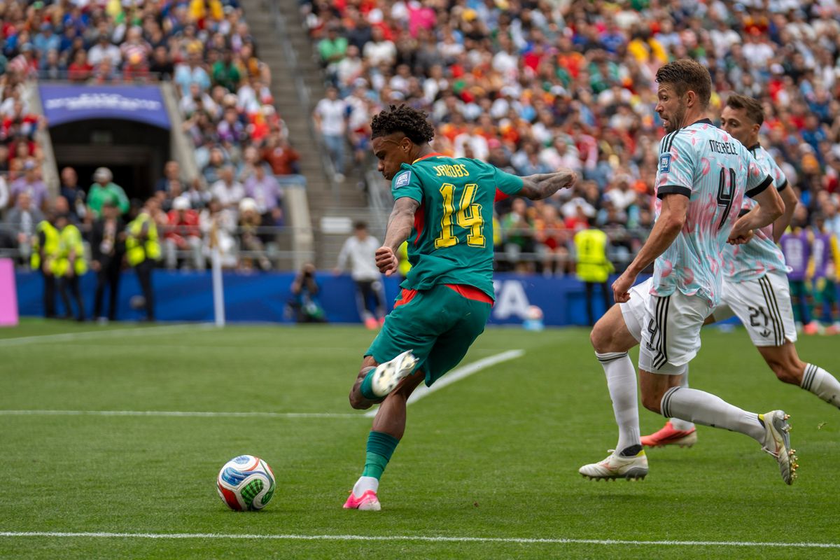 #14 Ismail Jakobs of Senegal sends a cross during a FIFA World Cup match against Belgium, Wednesday July 1st, 2026 in Seattle, Washington. #14 Ismail Jakobs of Senegal sends a cross during a FIFA World Cup match against Belgium, Wednesday July 1st, 2026 in Seattle, Washington.