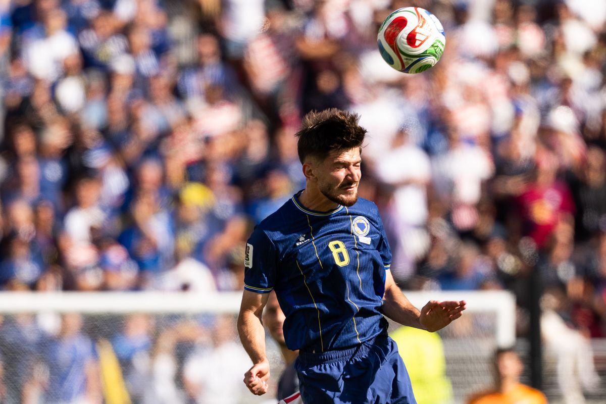 Armin Gigovic (8) of Bosnia and Herzegovina goes for a header during a 2026 FIFA World Cup match against the USA, Wednesday July 1st, 2026 in Santa Clara, Calif. Armin Gigovic (8) of Bosnia and Herzegovina goes for a header during a 2026 FIFA World Cup match against the USA, Wednesday July 1st, 2026 in Santa Clara, Calif.