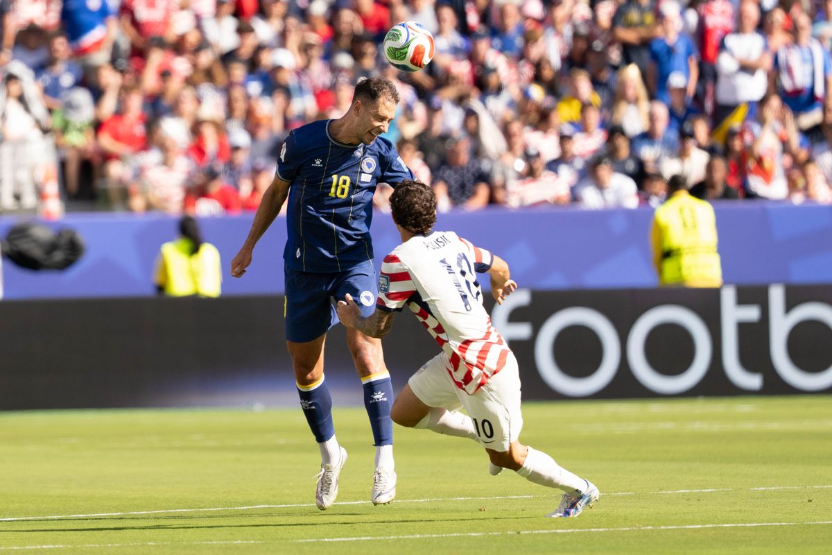 Nikola Katic (18) of Bosnia and Herzegovina goes for a header during a 2026 FIFA World Cup match against the USA, Wednesday July 1st, 2026 in Santa Clara, Calif. Nikola Katic (18) of Bosnia and Herzegovina goes for a header during a 2026 FIFA World Cup match against the USA, Wednesday July 1st, 2026 in Santa Clara, Calif.