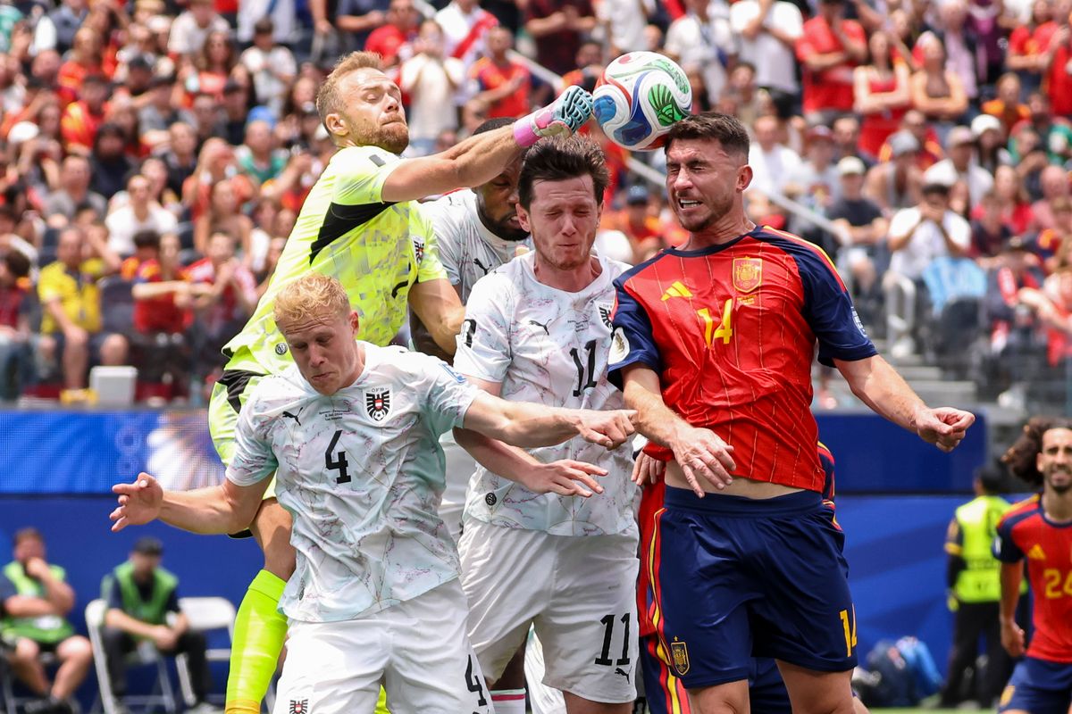 Alexander Schlager #1 of Austria punches the ball as Aymeric Laporte #14 of Spain tries to head it during a 2026 FIFA World Cup match, Thursday July 2, 2026 in Inglewood, Calif. Alexander Schlager #1 of Austria punches the ball as Aymeric Laporte #14 of Spain tries to head it during a 2026 FIFA World Cup match, Thursday July 2, 2026 in Inglewood, Calif.