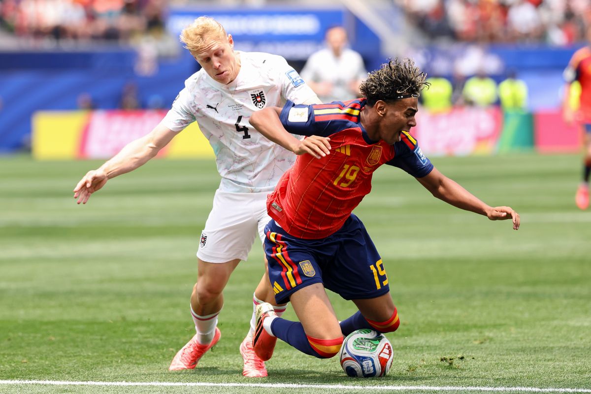 Lamine Yamal #19 of Spain falls as Xaver Schlager #4 of Austria defends during a 2026 FIFA World Cup match, Thursday July 2, 2026 in Inglewood, Calif. Lamine Yamal #19 of Spain falls as Xaver Schlager #4 of Austria defends during a 2026 FIFA World Cup match, Thursday July 2, 2026 in Inglewood, Calif.