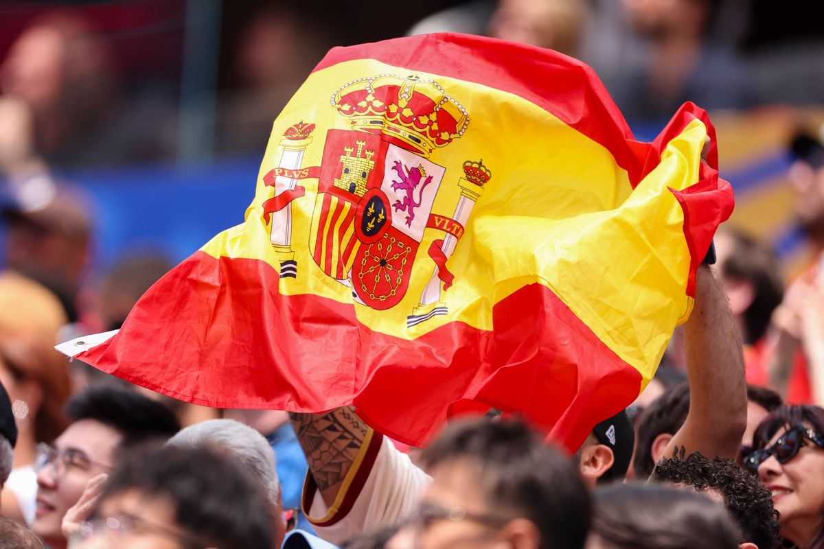 A fan holds a Spanish flag during a 2026 FIFA World Cup match between Spain and Austria, Thursday July 2, 2026 in Inglewood, Calif. A fan holds a Spanish flag during a 2026 FIFA World Cup match between Spain and Austria, Thursday July 2, 2026 in Inglewood, Calif.