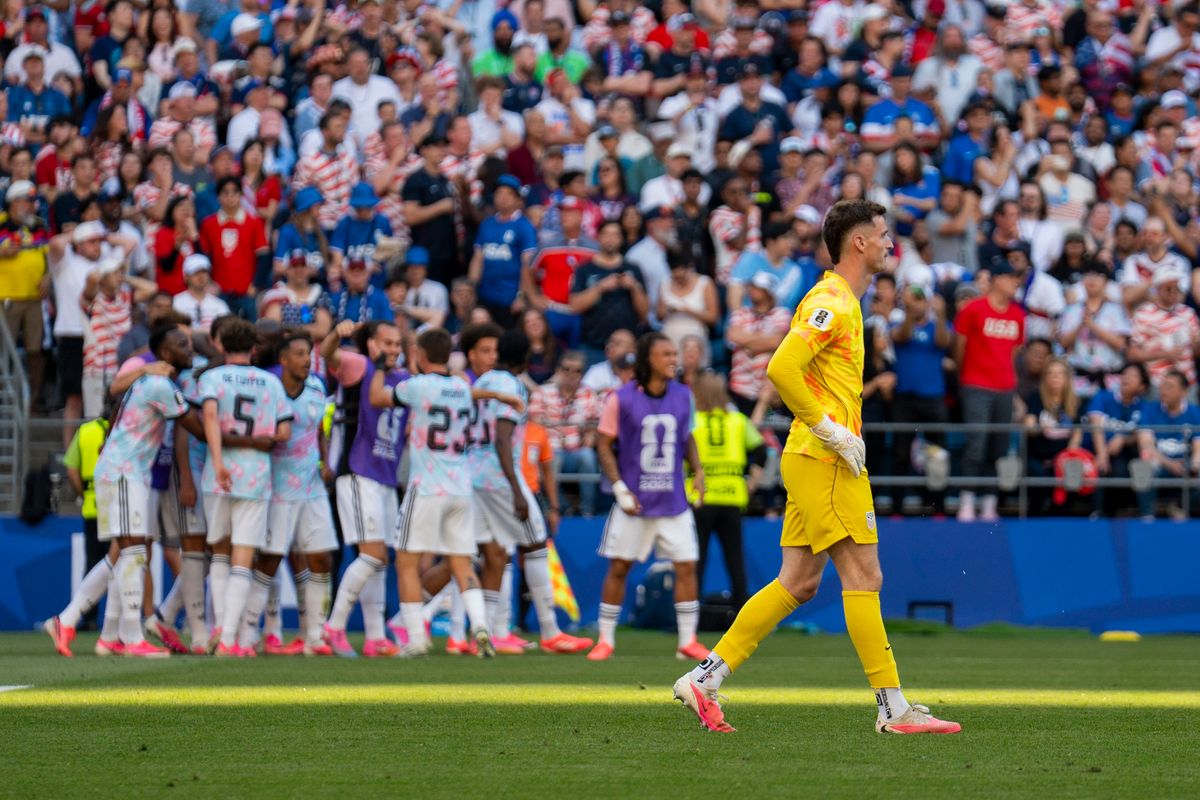 The goalie Matt Freese of the United States takes a moment while Belgium celebrates their goal in the background during a FIFA World Cup match against Belgium, Monday July 6th, 2026 in Seattle, Washington. The goalie Matt Freese of the United States takes a moment while Belgium celebrates their goal in the background during a FIFA World Cup match against Belgium, Monday July 6th, 2026 in Seattle, Washington.