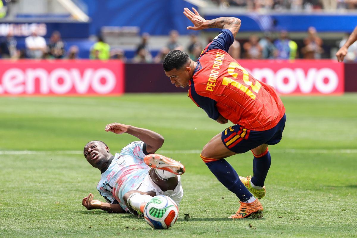 Pedro Porro #12 of Spain and Jérémy Doku #11 of Belgium compete for the ball during a 2026 FIFA World Cup match, Friday July 10, 2026 in Inglewood, Calif. Pedro Porro #12 of Spain and Jérémy Doku #11 of Belgium compete for the ball during a 2026 FIFA World Cup match, Friday July 10, 2026 in Inglewood, Calif.